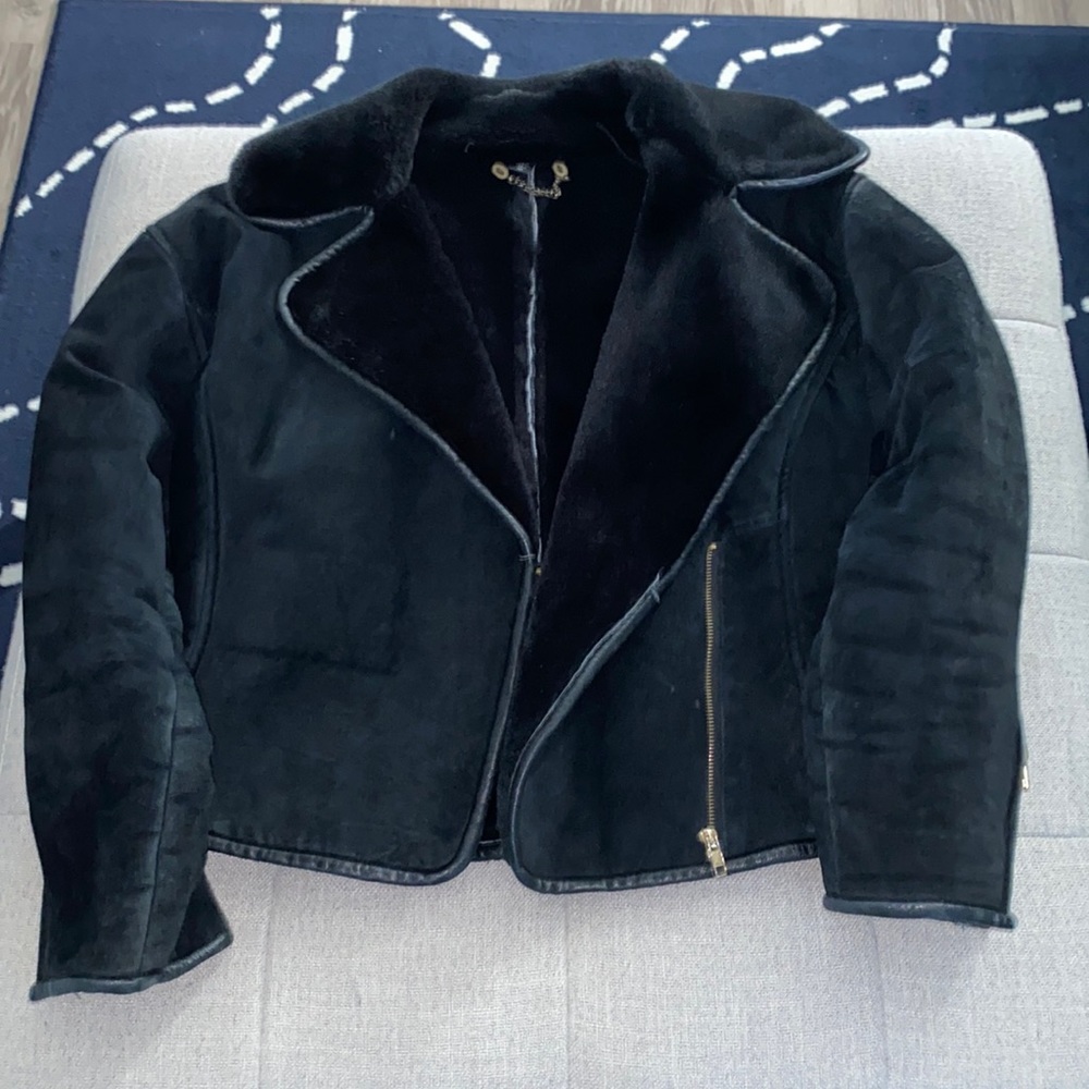 Black winter fur inside waist coat. Very good condition size M